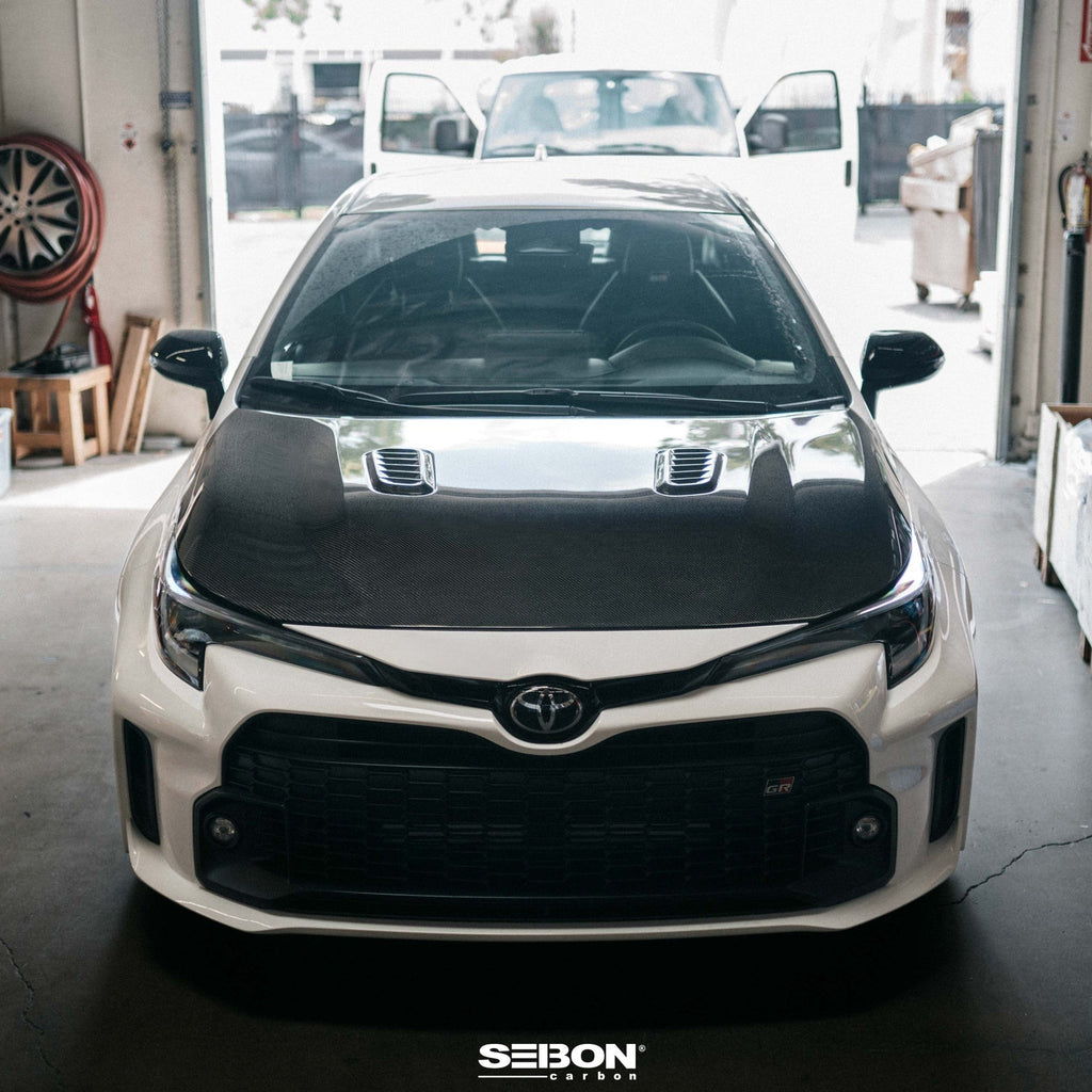 Seibon OE-Style Carbon Fiber Hood | 2023+ Toyota GR Corolla (HD23TYGRCOR-OE)